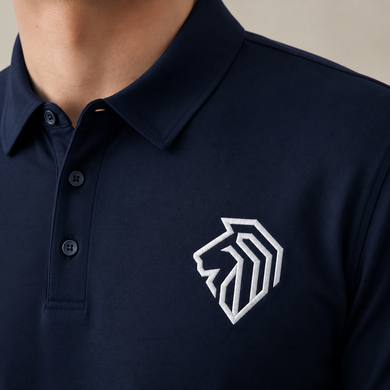 The Lion Mark — Embroidered Polo