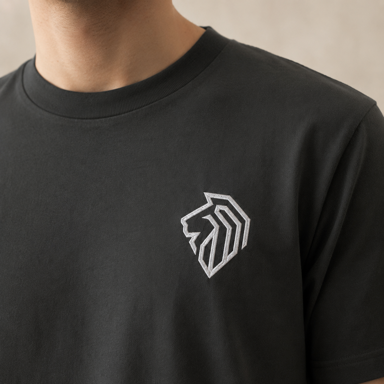 The Lion Mark — Embroidered Tee